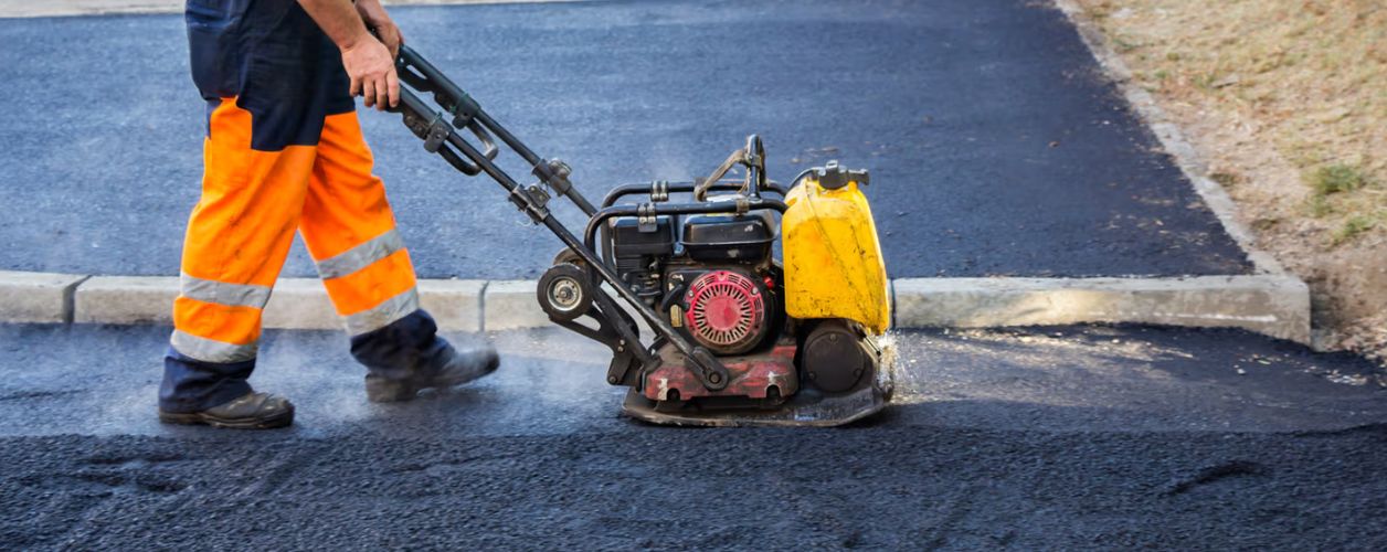 How Much Do Asphalt Contractors Cost? (2026)